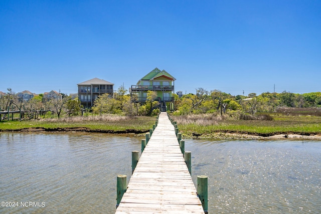 view of dock with a water view