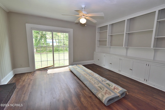 spare room featuring ceiling fan and dark hardwood / wood-style flooring