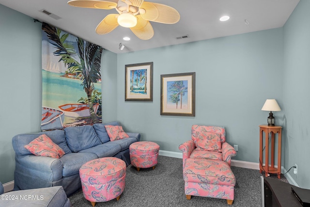 carpeted living room featuring ceiling fan