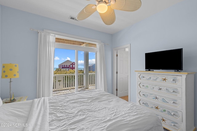 bedroom with light wood-type flooring, ceiling fan, and access to exterior