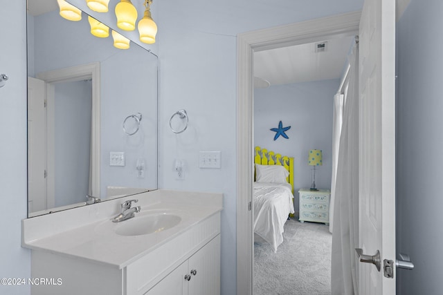 bathroom with vanity with extensive cabinet space