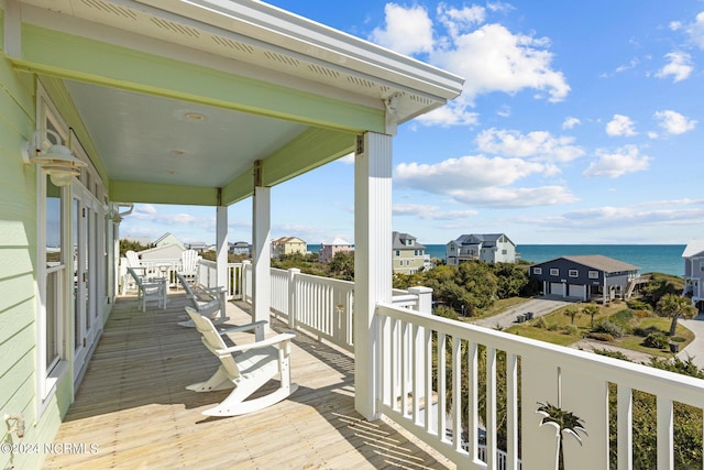 deck featuring a water view