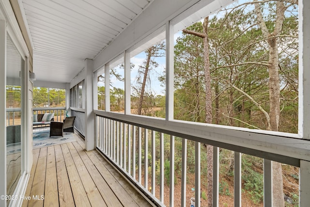 unfurnished sunroom featuring a wealth of natural light