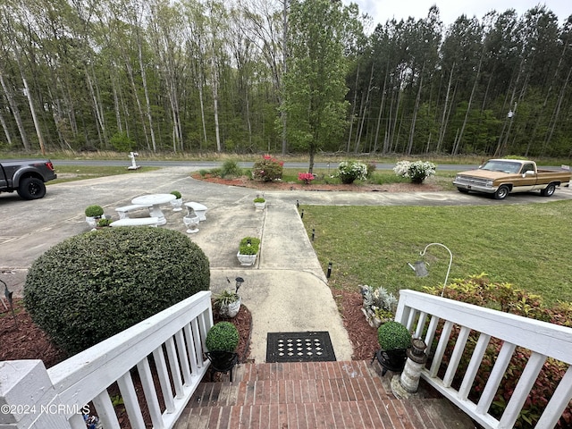 view of yard featuring a view of trees