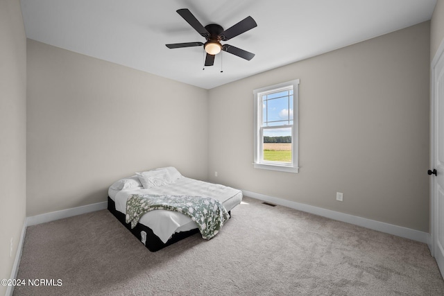 bedroom featuring carpet flooring and ceiling fan