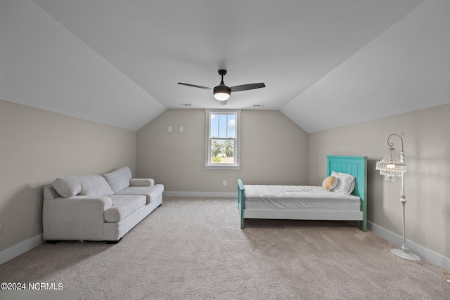 bedroom featuring carpet, ceiling fan, and lofted ceiling