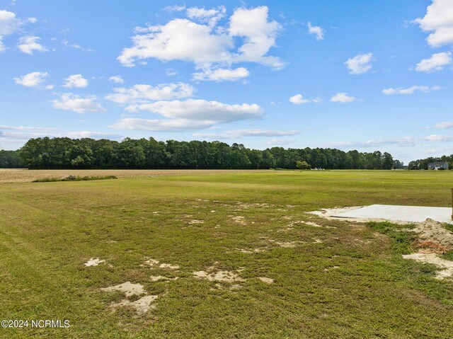 exterior space with a rural view