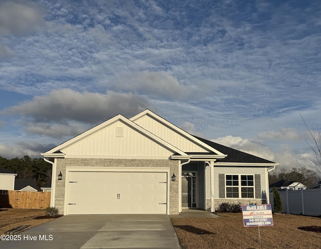 craftsman-style home with a garage