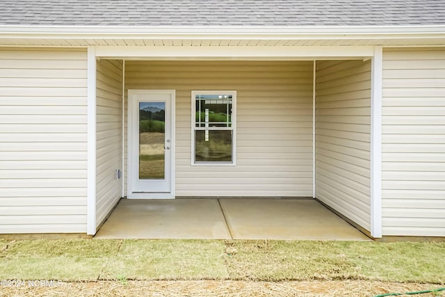 doorway to property featuring a patio