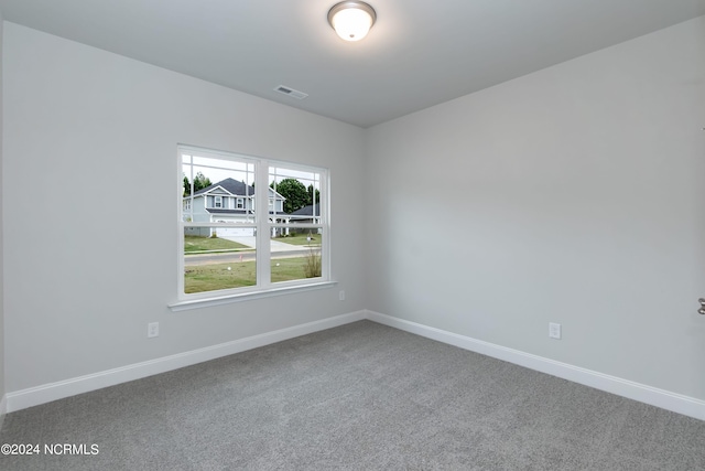 empty room featuring carpet floors