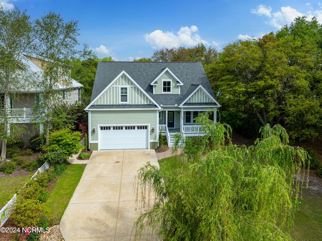 view of front of home featuring a garage and covered porch