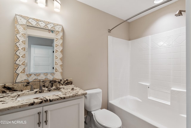 full bathroom with shower / tub combination, vanity, and toilet