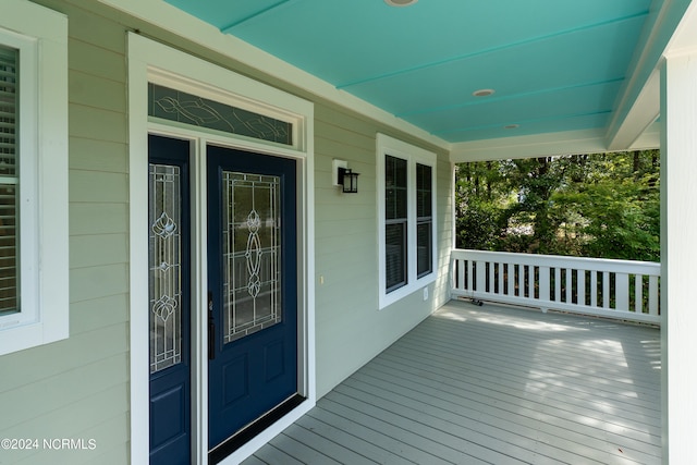 wooden terrace with covered porch