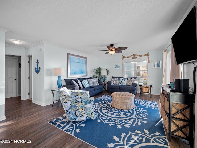 living room with ceiling fan, crown molding, a textured ceiling, and hardwood / wood-style flooring