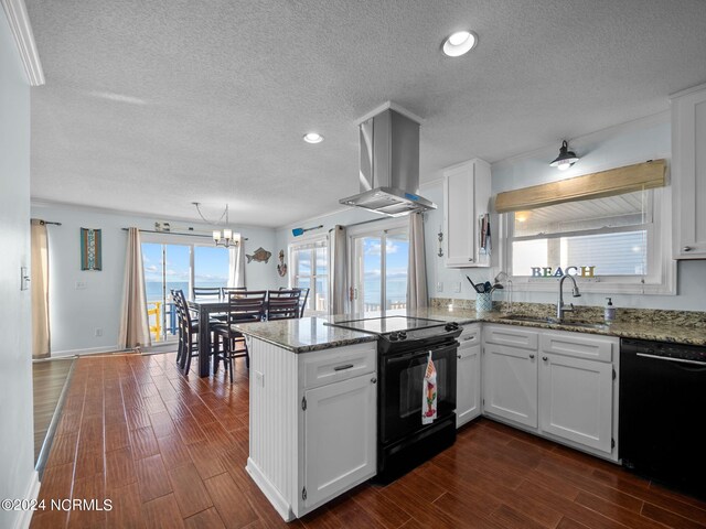 kitchen with kitchen peninsula, extractor fan, dishwasher, and stove