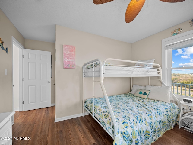 bedroom featuring ceiling fan and hardwood / wood-style flooring