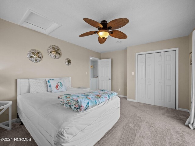 bedroom featuring carpet, a closet, and ceiling fan