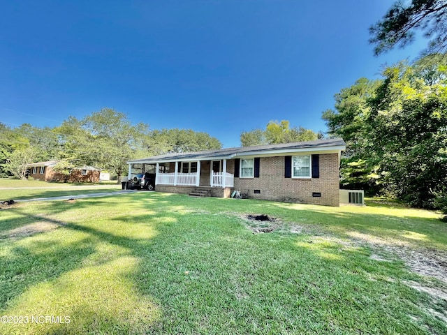 view of front of property with a front lawn and covered porch