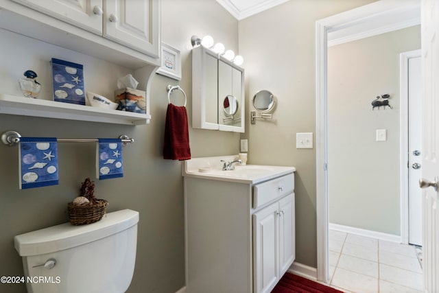 bathroom with vanity, tile patterned floors, ornamental molding, and toilet