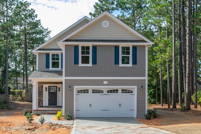 view of front of property featuring a garage