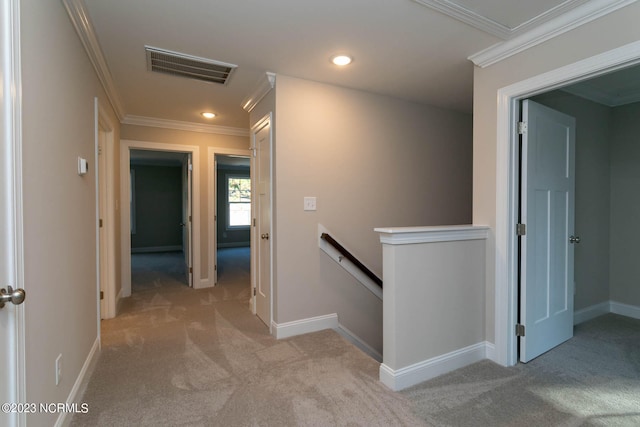 corridor featuring light carpet and ornamental molding