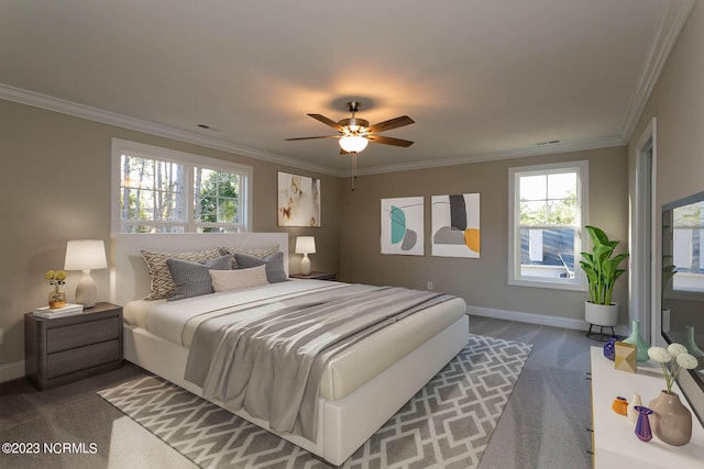 bedroom featuring ceiling fan, dark carpet, and ornamental molding