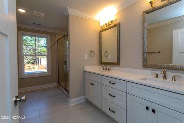 bathroom featuring walk in shower, dual vanity, and ornamental molding