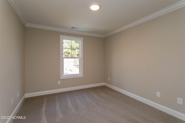 unfurnished room featuring dark carpet and ornamental molding