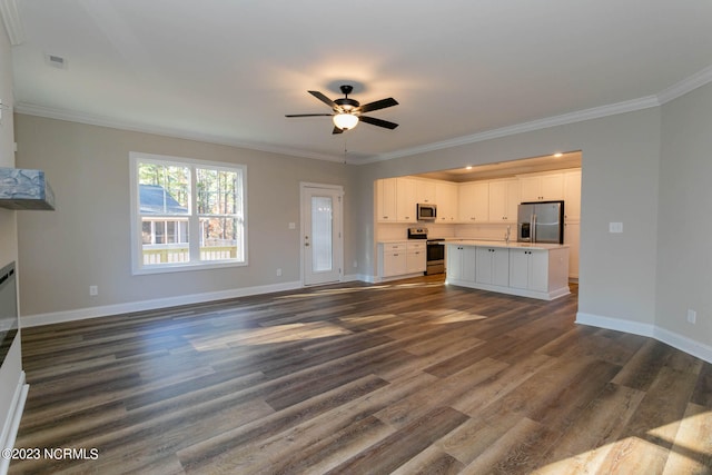 unfurnished living room featuring dark hardwood / wood-style flooring, ceiling fan, and crown molding