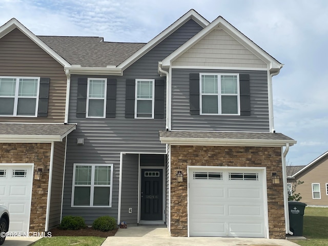 view of front of property with a garage