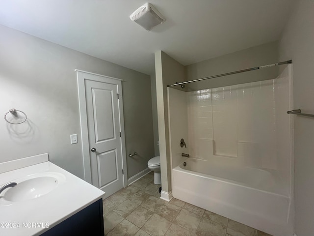 full bathroom with  shower combination, vanity, and toilet