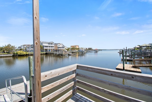 dock area with a water view