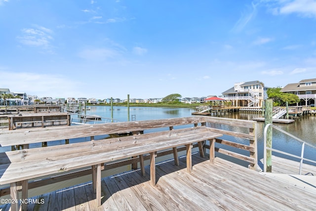 view of dock with a water view