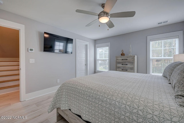 bedroom featuring ceiling fan and light wood-type flooring