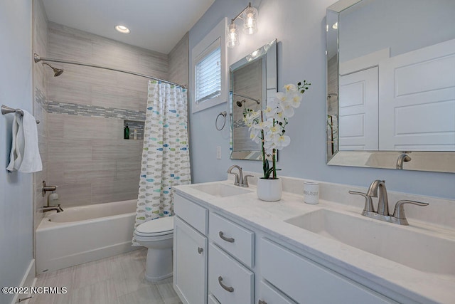 full bathroom featuring tile floors, shower / tub combo, toilet, and dual bowl vanity