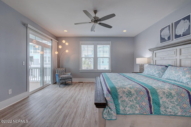 bedroom with light hardwood / wood-style floors, ceiling fan, and access to outside