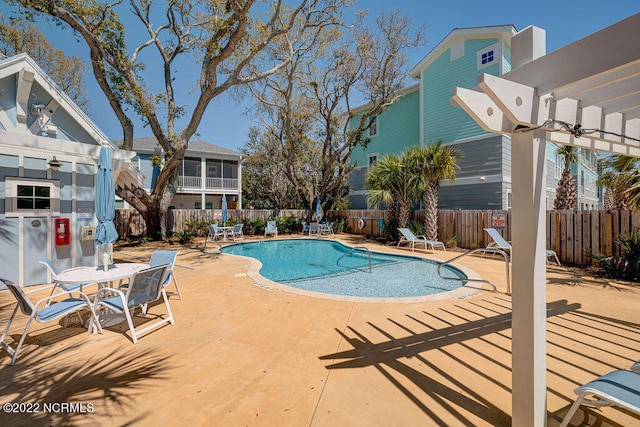 view of swimming pool featuring a patio