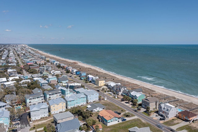 bird's eye view with a view of the beach and a water view