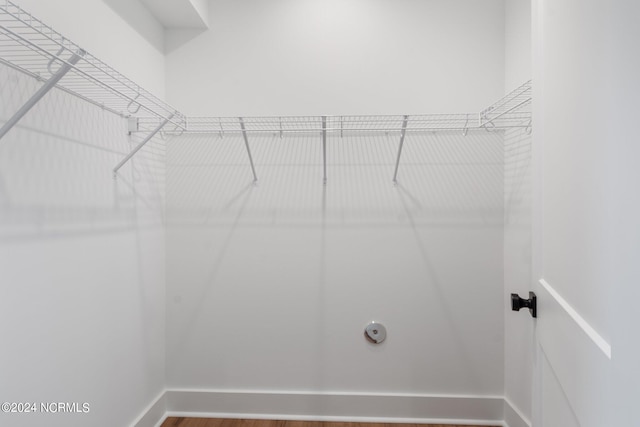 walk in closet featuring hardwood / wood-style floors