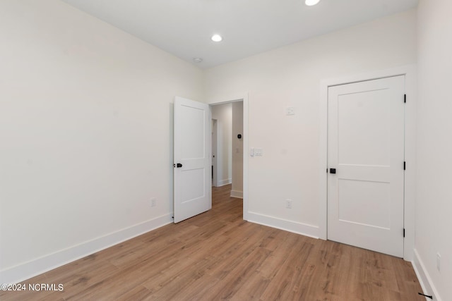 unfurnished bedroom with light hardwood / wood-style flooring