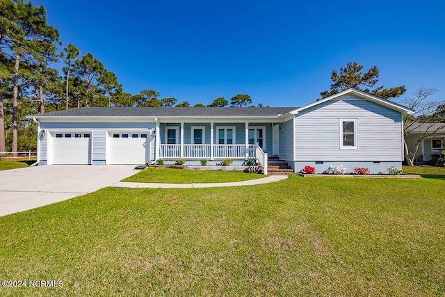 ranch-style home with a porch, a garage, and a front yard