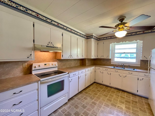 kitchen with ceiling fan, light tile floors, white cabinets, sink, and white appliances