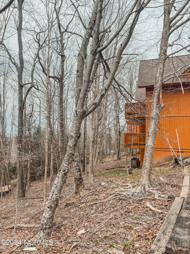 view of yard with a wooden deck