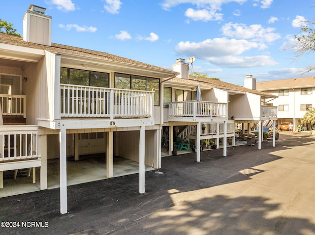 exterior space with a carport