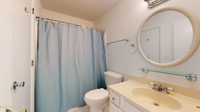 bathroom featuring toilet, tile floors, vanity, and a textured ceiling