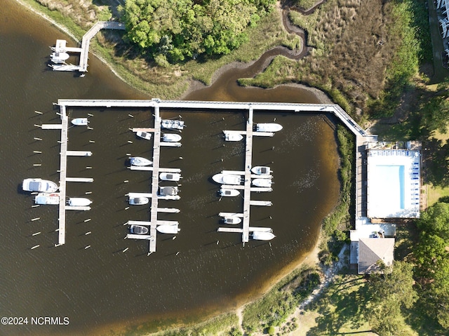 birds eye view of property featuring a water view