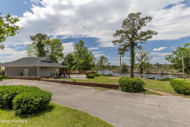167 Dockside Dr, Jacksonville, NC 28546 - view of front of property featuring a water view and a front yard