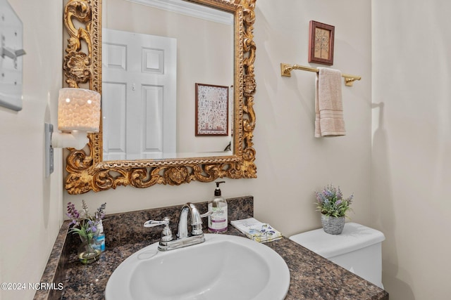 bathroom with sink and toilet