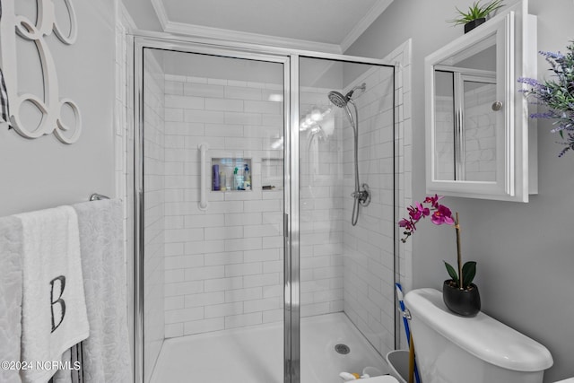 bathroom featuring walk in shower, crown molding, and toilet