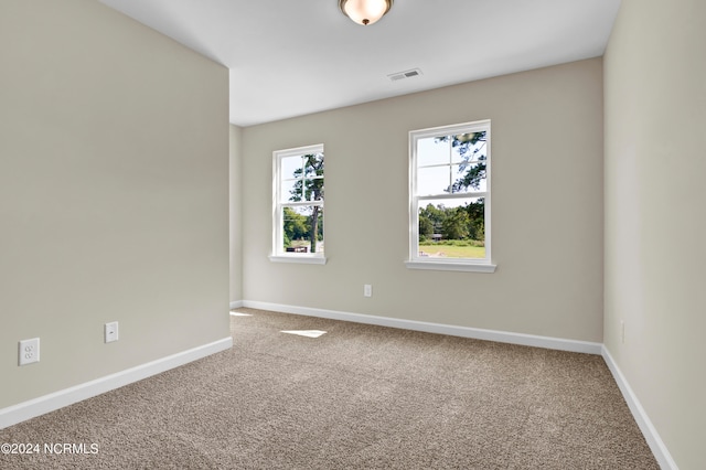 view of carpeted spare room